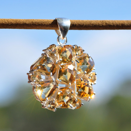 Pendentif argent 12 pierres griffées en citrine facettée
