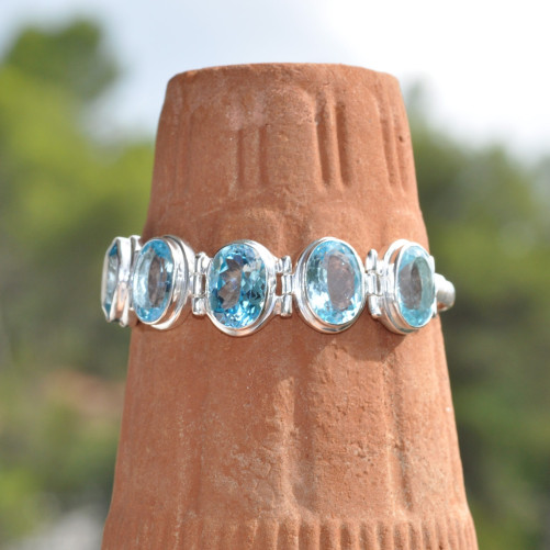 Bracelet argent semi-rigide 5 pierres facettées en topaze bleue