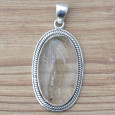 Pendentif ovale argent ciselé et Quartz rutile Pendentif ovale argent ciselé et Quartz rutile