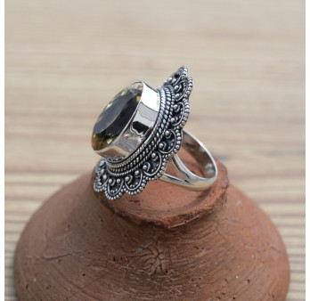 Bague fleur en pierre Citrine facettée et argent ciselé (jaune) T54