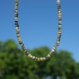 Collier pierres naturelles facettées en Oeil de chat