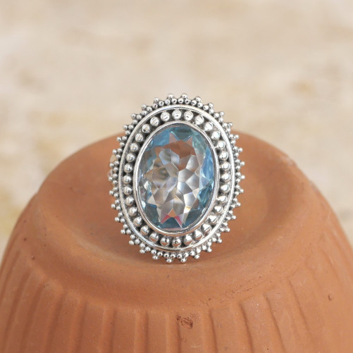 Bague en argent ciselé et pierre ovale Topaze bleue T51