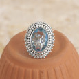 Bague en argent ciselé et pierre ovale Topaze bleue T51