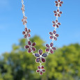 Collier fleurs en argent et pierres facettées en Grenat