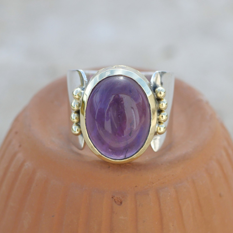 Bague large en pierre Améthyste sur monture dorée en argent T58