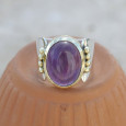 Bague large en pierre Améthyste sur monture dorée en argent T58