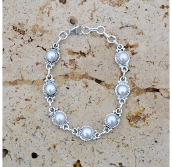 Bracelet argent ciselé et 7 Perles de culture rondes