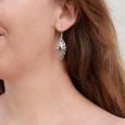 Grandes boucles navette argent ajouré et pierre Topaze bleue