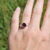 Bague en argent et pierre ronde en Grenat facettée T51